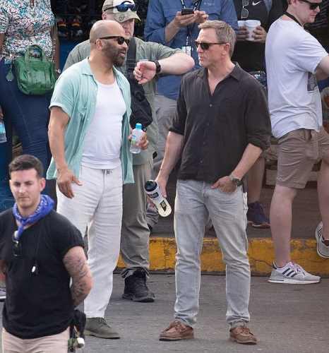 Bond (Daniel Craig) and Felix (Jeffrey Wright) on the No Time To Die set in Jamaica.